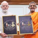 Narendra-Modi-Pejawara-Vishwaprasanna-Tirtha-unveils-centenary-logo